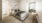a bedroom with a bed and a table