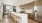 a kitchen with a table and chairs