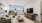 Living room with green couch and tv