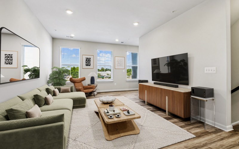 a living room with a couch and a table