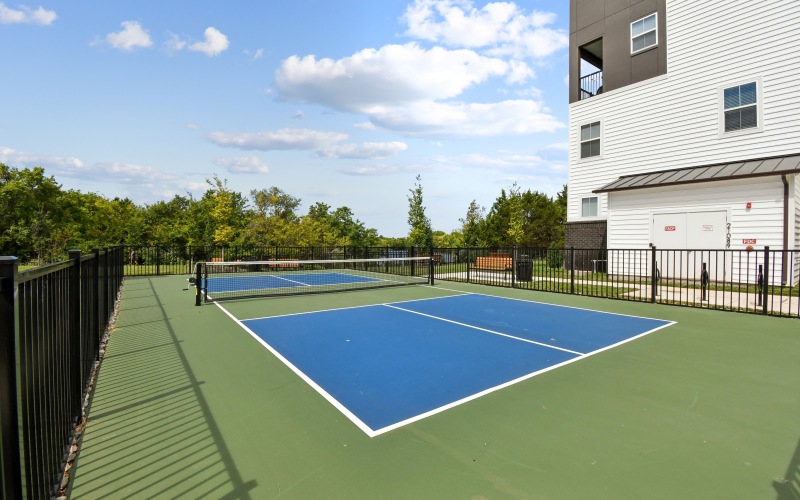 a pickleball court with a net