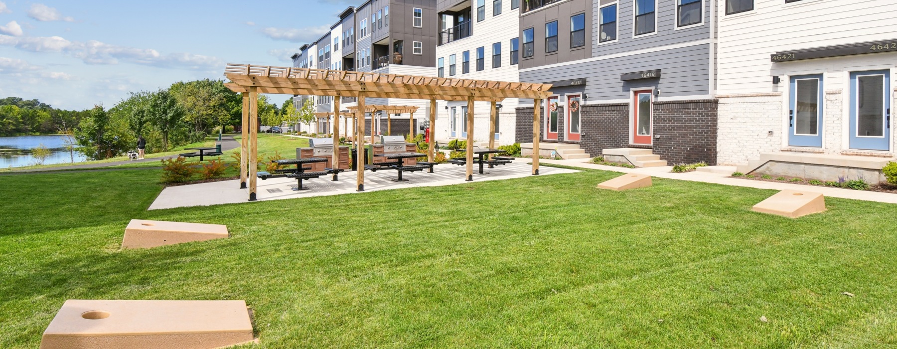 a building with a green space and games
