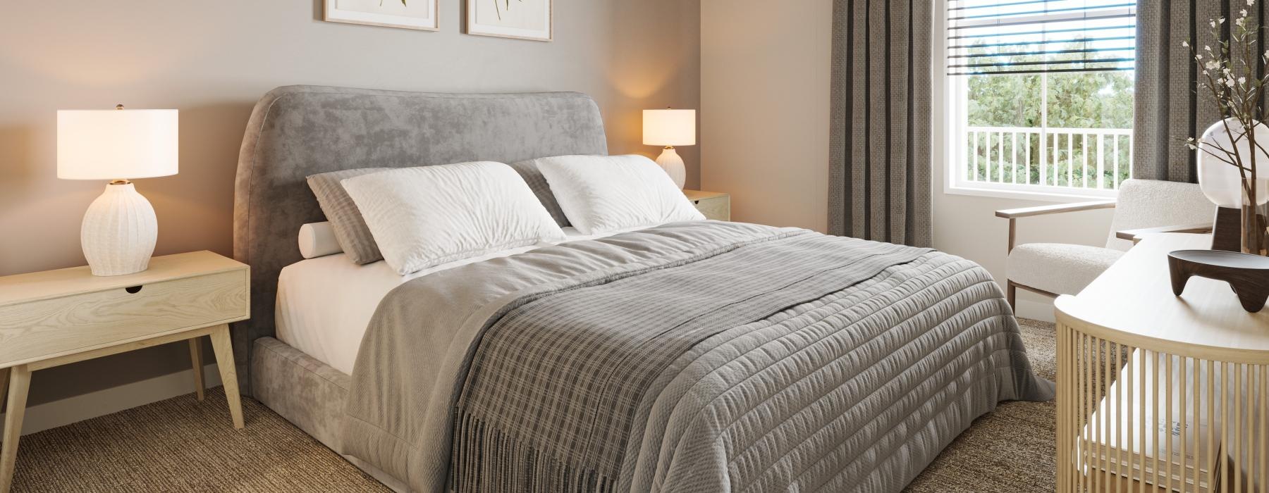 a bedroom with a bed and lamps